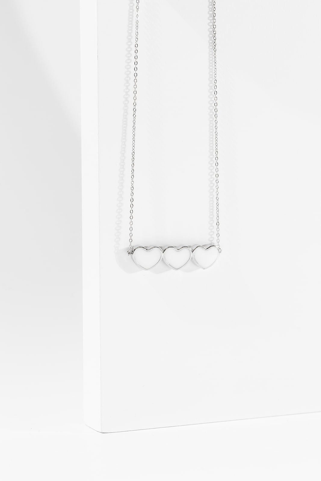 Heart strings necklace - White Gold